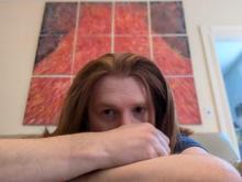 myself, large painting of a volcano in background