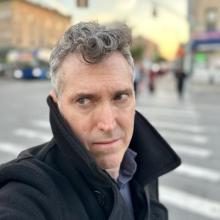 Brendan Lorber in a peacoat on a cold NYC street