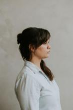 profile of Jessica with her long hair half up 